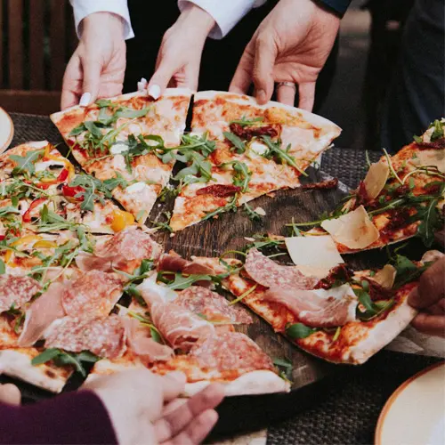 Sharing delicious pizza