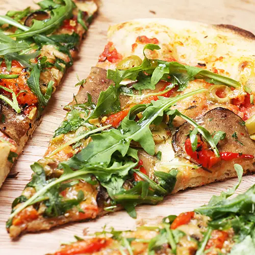Slice of Prosciutto Arugula Pizza